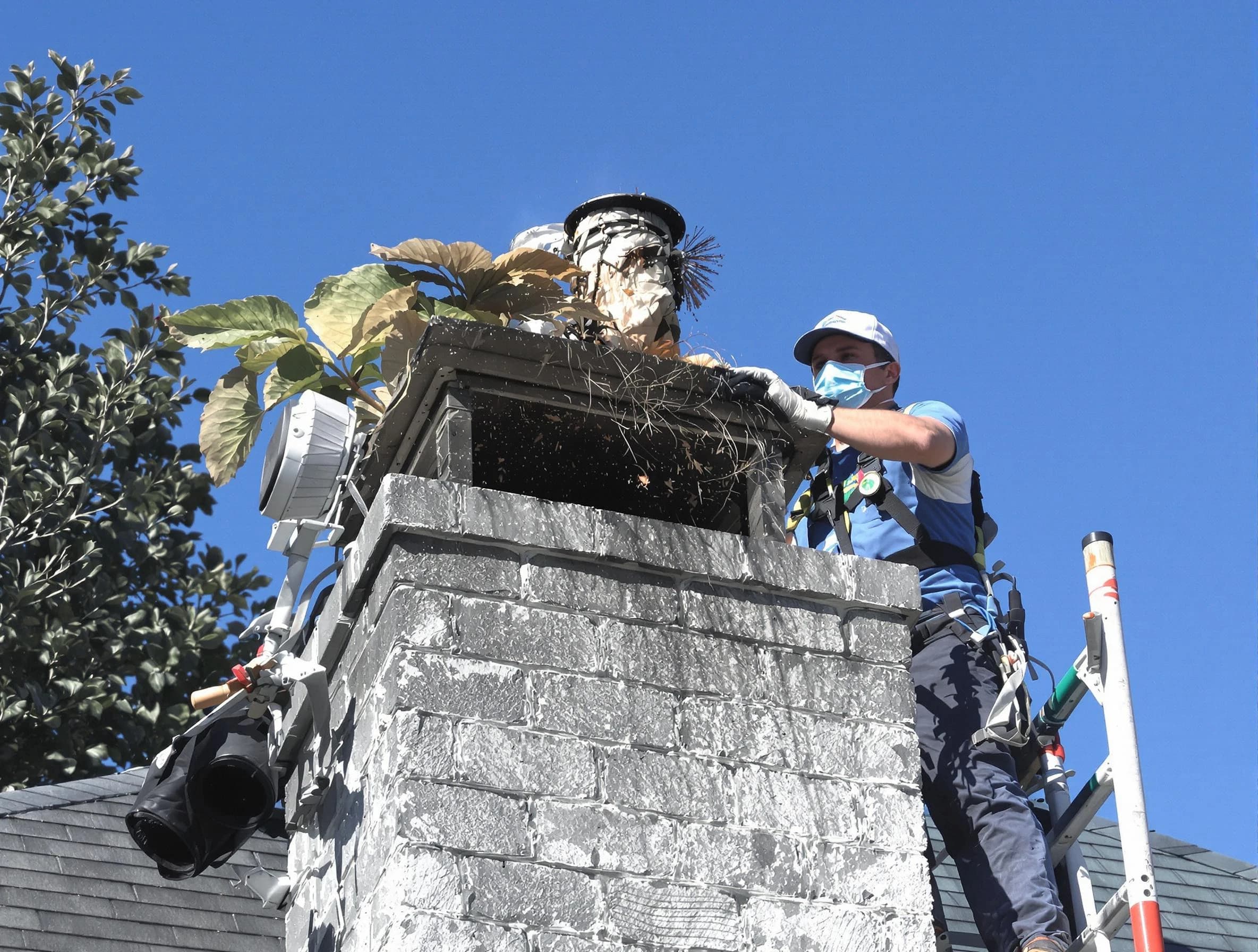 Brick Chimney Sweep specialist performing chimney cleaning in Brick, NJ